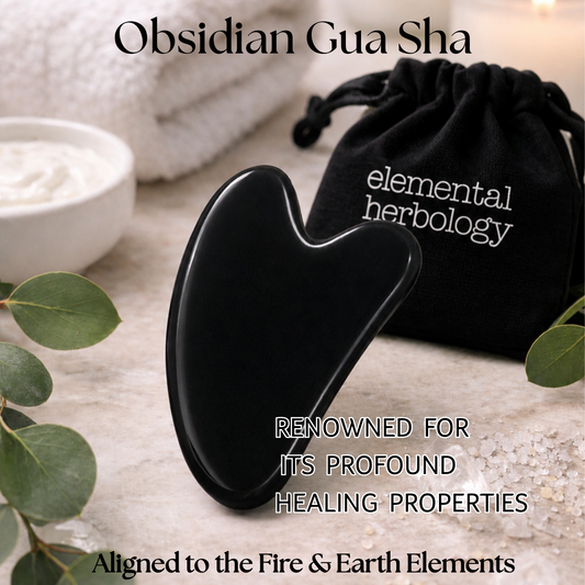 Black obsidian gua sha tool with packaging on a neutral background
