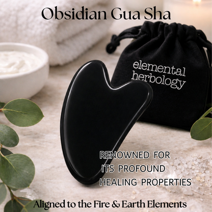 Black obsidian gua sha tool with packaging on a neutral background